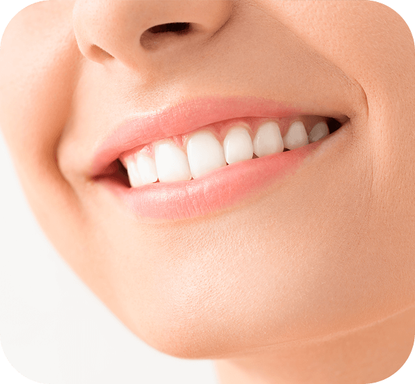 A woman with bright white teeth smiling with her cheerful expression.